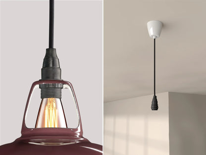 Close up of an E14 Industrial suspension set on a Metropolitan lampshade on the left. On the right, an E14 Industrial pendant set is hanging from the ceiling
